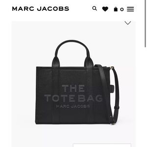 Brand new with tags sealed The famous Black Marc Jacob tote bag